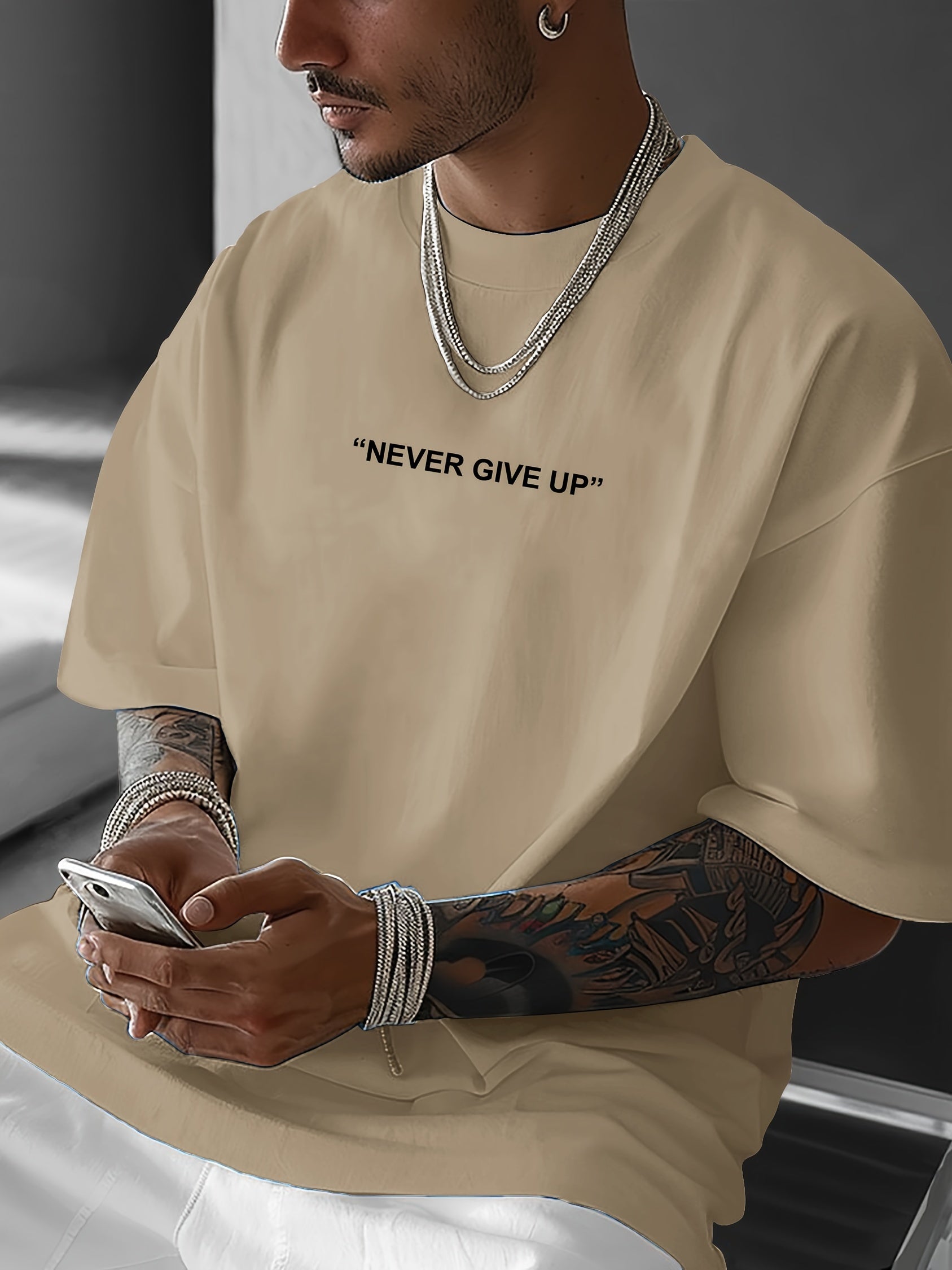 Men's oversized t-shirt casual wear - inspirational 'never give up' tee, soft fabric